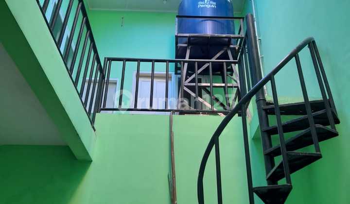 Citra 2 Ext, West Jakarta.. For Sale 2-Story House, Facing East, Empty, PLN 2200W, Tap Water, SHM.-WT 2