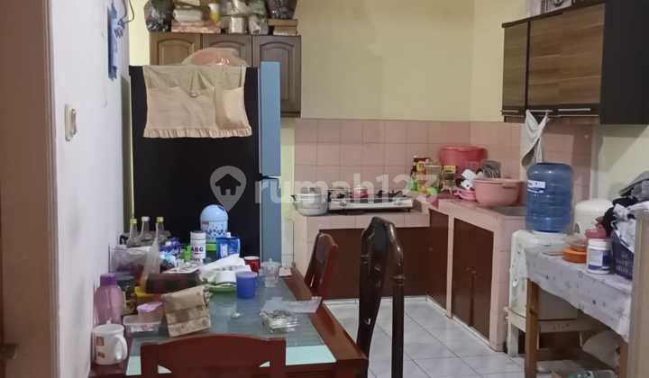 Puri Gardena, Kalideres, West Jakarta. For Sale: 1-Story House, Owner Wants to Rent Back for 1 Year Due to Existing Work Contract in the Area, West-Facing, Running PAM Water, 2200w PLN Electricity. 2