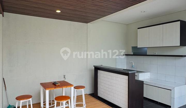 Nice furnished house cheap Citraland Surabaya northwest minimalist 2