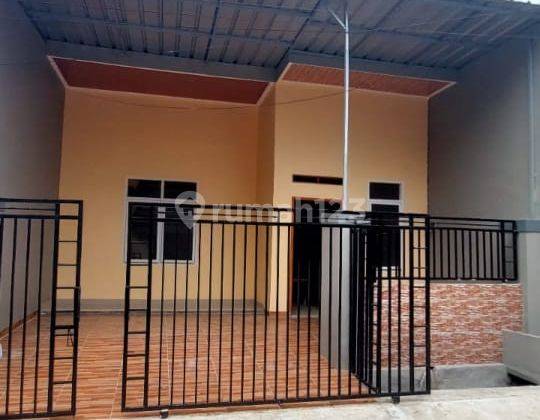 Rumah Coklat lokasi dalam Cluster di Bulevard Hijau Harapan Indah 1