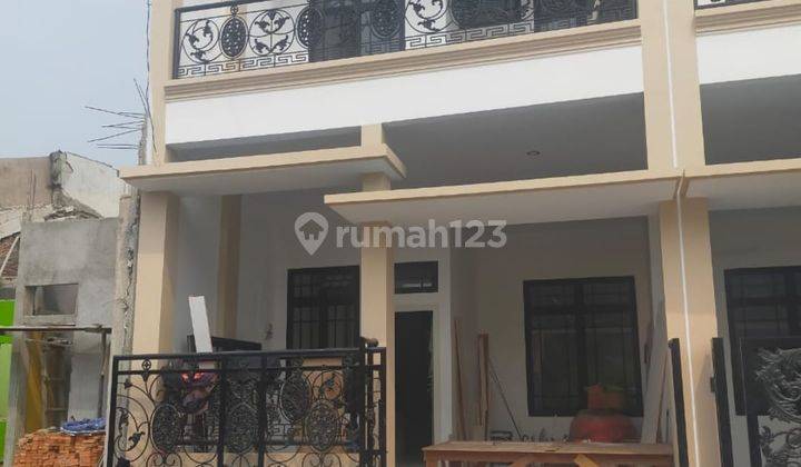 Rumah 2 Lantai Minimalis Dalam Cluster Boulevard Hijau 1