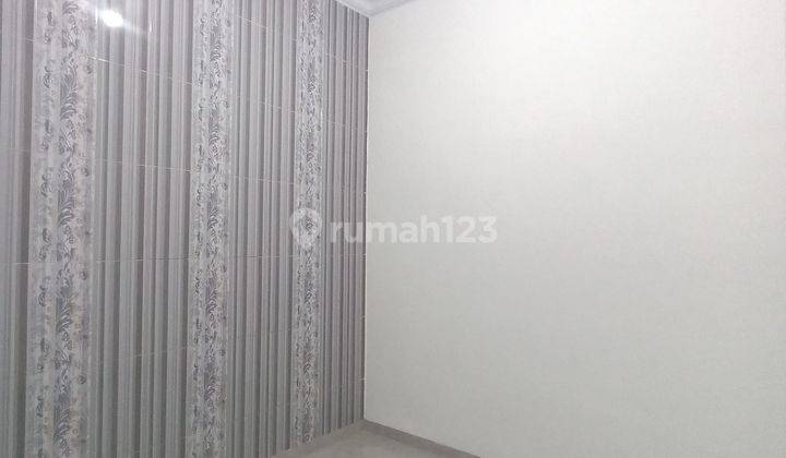 Rumah 2 Lantai Minimalis Dalam Cluster Boulevard Hijau 2