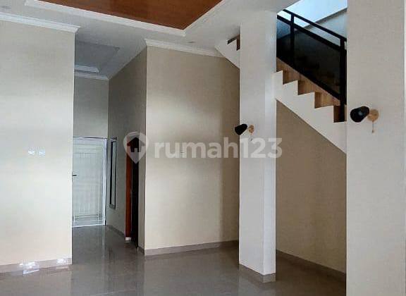 Minimalist 2-story house ready to occupy on the main road of Harapan Indah complex. 2