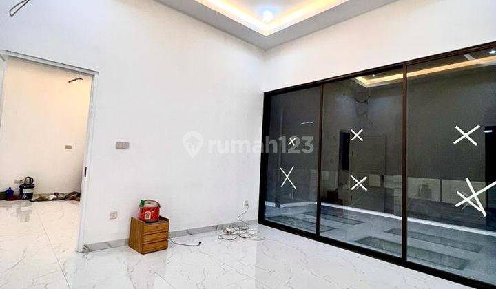 Rumah Pluit 200m, 3.5 Lantai, Minimalis, Ceiling Tinggi, Sirkulasi Udara Cahaya Bagus 2