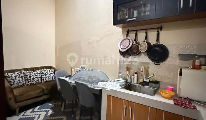 For Sale, Well-Maintained Second-Hand House in Bintara Jaya, Bekasi