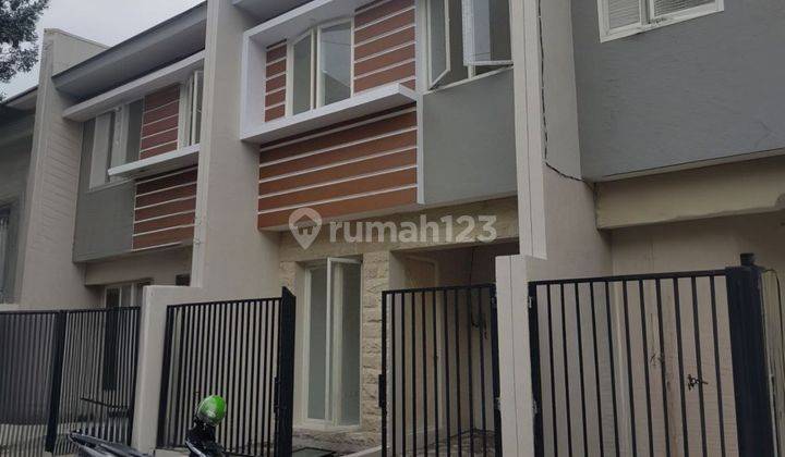 Rumah Regency One Kapas Madya Minimalis Siap Huni Carport 1