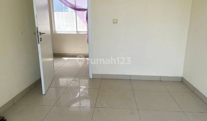  Rumah Kontrakan Unfurnished di Green Lake City 2