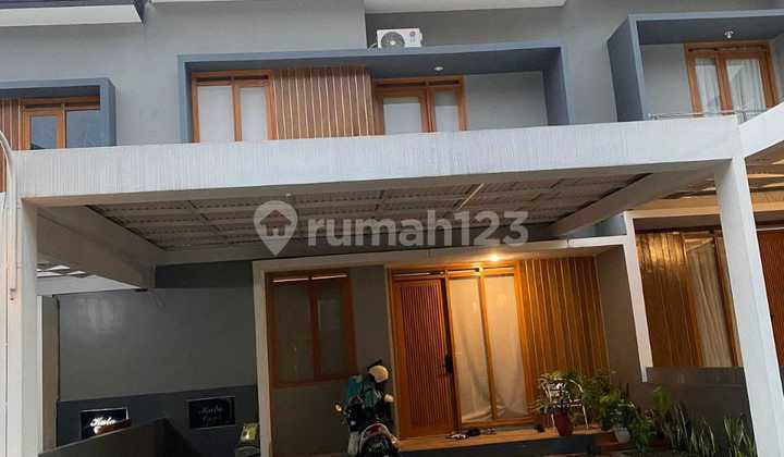 Rumah minimalis modern one gate bali garden city view bandung 2