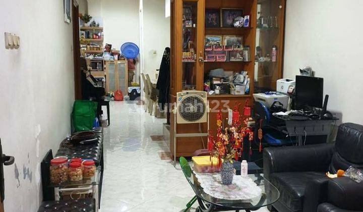 Dijual Rumah di Taman Surya 3 2 Lantai SHM Kondisi Bagus Hadap Barat Daya 1