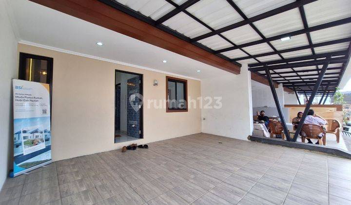 Rumah baru Carport 2 mobilsiap huni jatiwaringinPondok gede  2