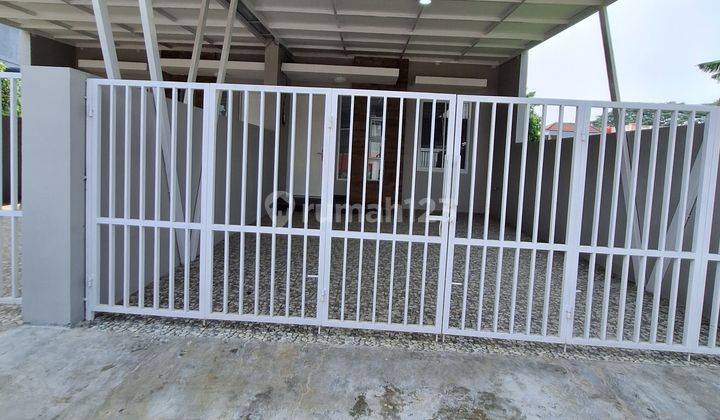 Rumah  dijual di JATI WARNA dt TOL LUAS MURAH Carport 2 mbl KANOP 2