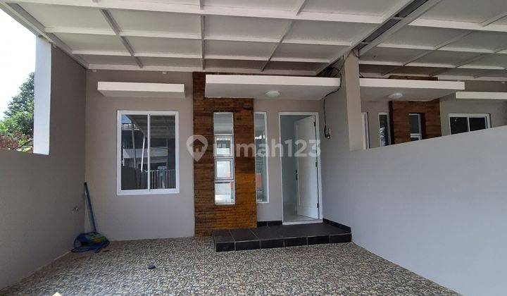 Rumah BARU MURAH Lt 130m 1,1M LUAS  dk TOL Jati warna Green Park  1