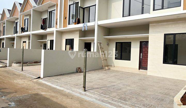 Rumah LUAS KT4 FREE PAJAK &KANOPI 1 km k TOL Jati Asih Etty 1