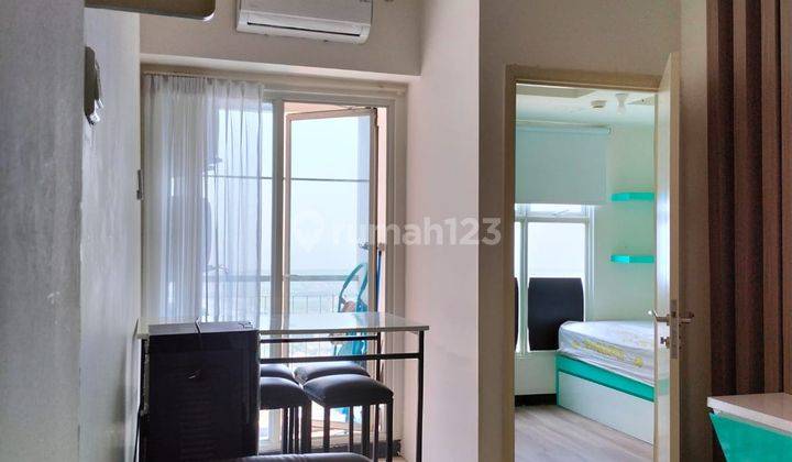 Best Deal Apartemen Pakuwon City Amor 2 Bedroom View Pool Full Furnish 1