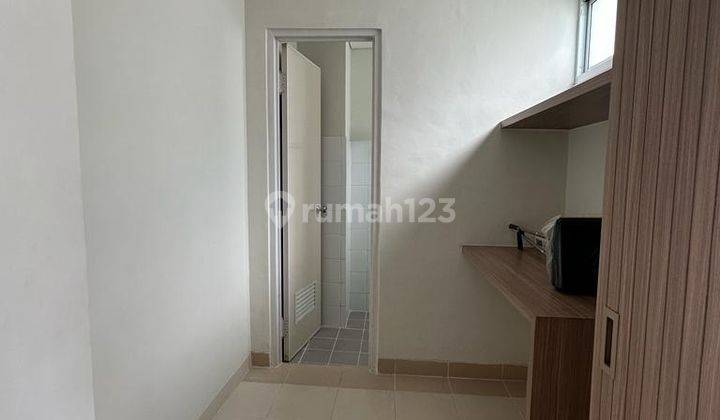 Apartement di Rainbow Spring Condovillas Tower B Lantai P 2