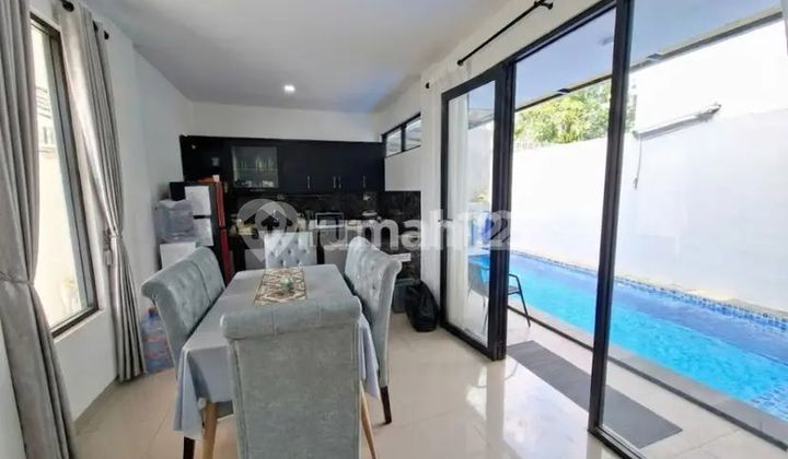 Modern 2-Story House in Setiabudi Regency, Private Swimming Pool & Spacious Carport 2