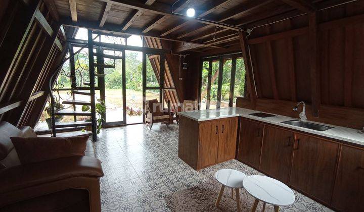 Rumah villa kayu vintage baru di Puncak Bogor, jaminan kualitas kayu 20tahun. Sudah SHM, IMB. Fasilitas kolam renang dan kolam ikan pribadi tiap. Cluster one gate system. Lokasi dekat jalan alternatif ke Taman Safari Bogor.Tersedia taman dan sungai kecil  8