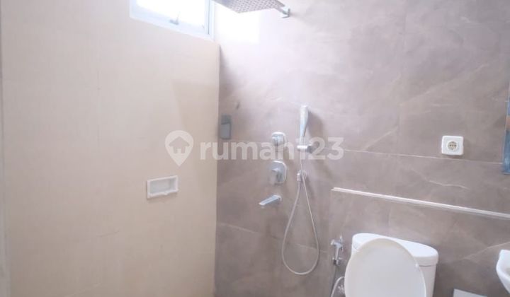 Beautiful House in Front of a New and Elite Cluster Park in Kota Wisata Cibubur. 2