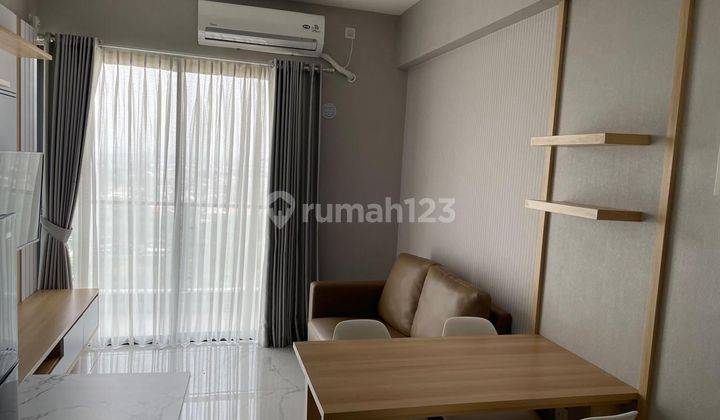 ruang keluarga apartemen murah sky house bsd