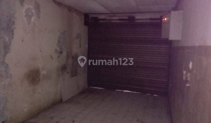 garasi/carport rumah lama strategis jalan utama