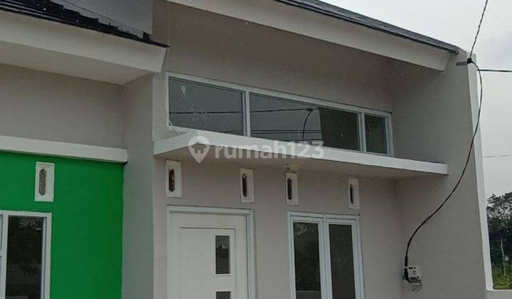 Rumah minimalis strategis pinggir jalan. DP nol rupiah.  10