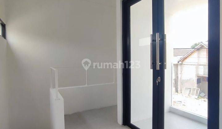 Rumah 2 Lantai modern dekat stasiun Depok Grand Depok City 2