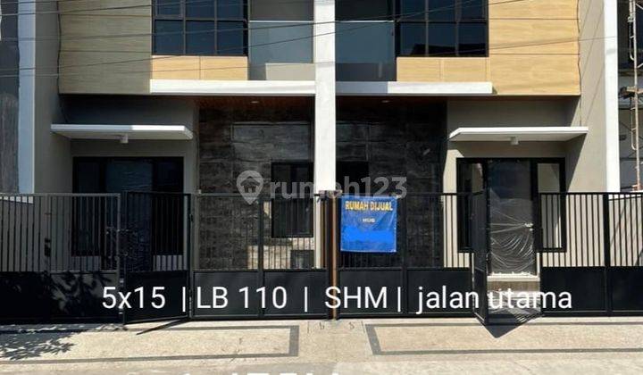 Rumah 2 Lantai Baru Unfurnished SHM di Kutisari Indah Selatan, Surabaya Rumah Baru Gress Minimalis Row Lebar 5 Mobil Kutisari Indah Selatan 1