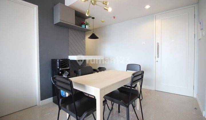 Apartment 2 BR furnished view kolam renang di Landmark Residence 2
