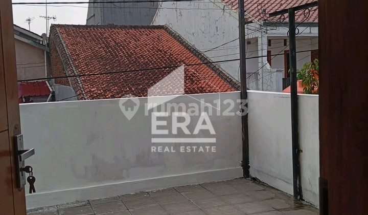 Minimalist 2-Story House in Central Antapani. 2