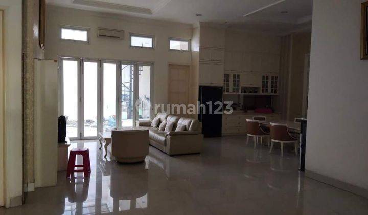 Rumah Pluit Permai 13x25 11/2lantai furnish hadap barat 1