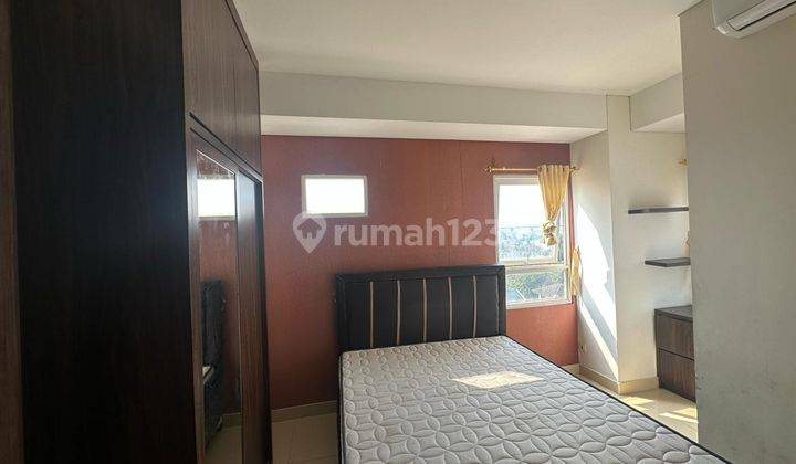 kamar tidur apartemen grand icon caman 2