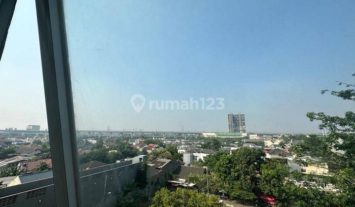 tampak depan apartemen grand icon caman 2