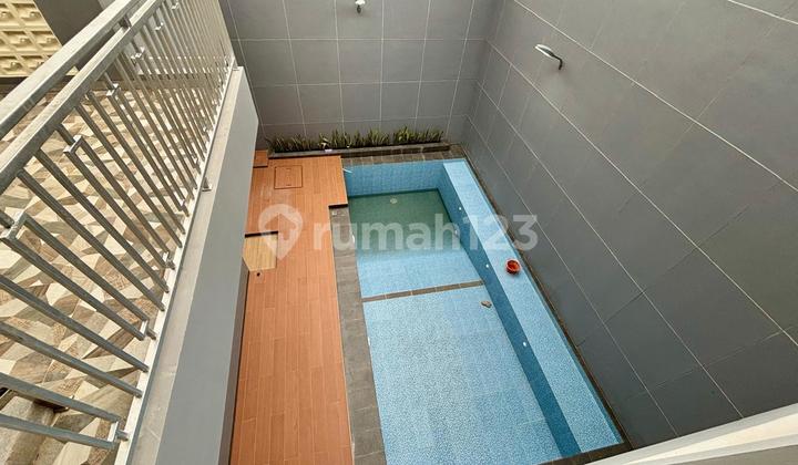 Modern Minimalist House with Swimming Pool on Main Road 2