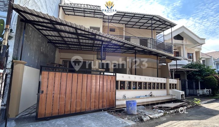 Rumah di Dalam Cluster dengan Tanah 208 di Melati Mas 1