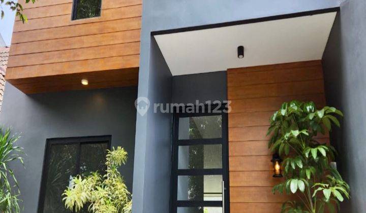 Rumah Industrial Tropis Dalam Lingkungan Yang Asri 1