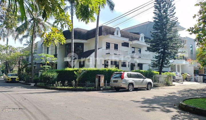 Own a 2-story house in a compound.