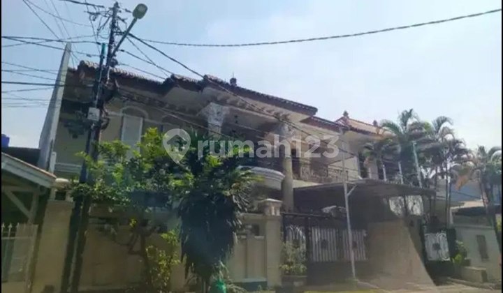 Hunian Elegan di Komplek Bona Indah – 300m², SHM, Hadap Taman!