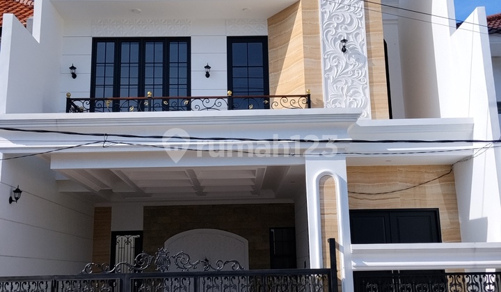 For Sale New 2-Story Semi Classic House in Babatan Pantai, East Surabaya. Close to ITS Campus - Widya Kartika, Mulyosari Main Road, Sutorejo, Pakuwon City, The Grand Kenjeran Housing Complex, Kenjeran Main Road, etc.