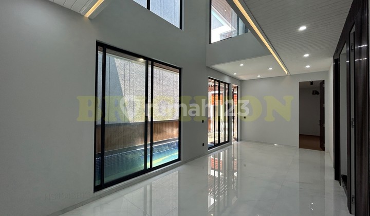 New 2-Story House with Swimming Pool in Pondok Nirwana, Rungkut, East Surabaya. Near Merr Rungkut - Ubaya Campus - Tenggilis - Kendangsari - Panjang Jiwo - Nginden - Kalirungkut - Pandugo - Raya Kedung Baruk - UPN Rungkut Madya Campus, etc. 2