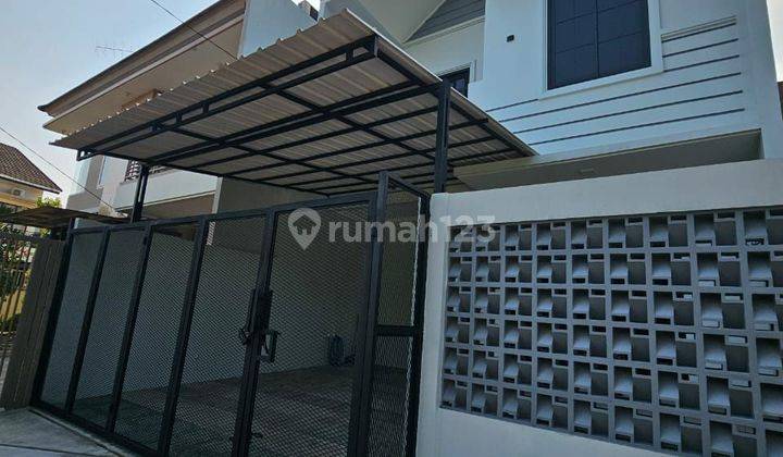 Jual rumah baru design mandiri di Kencana Loka BSD - hadap taman 2