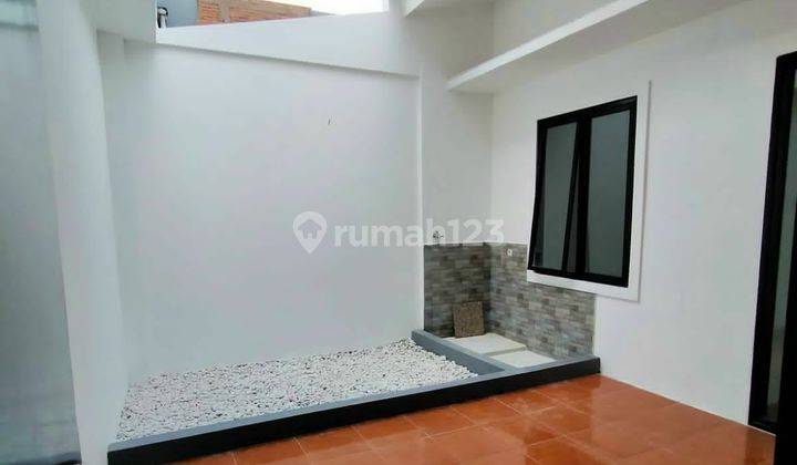 Jual rumah 1 lantai baru renovasi di Griya Loka BSD - free kitchen set 2