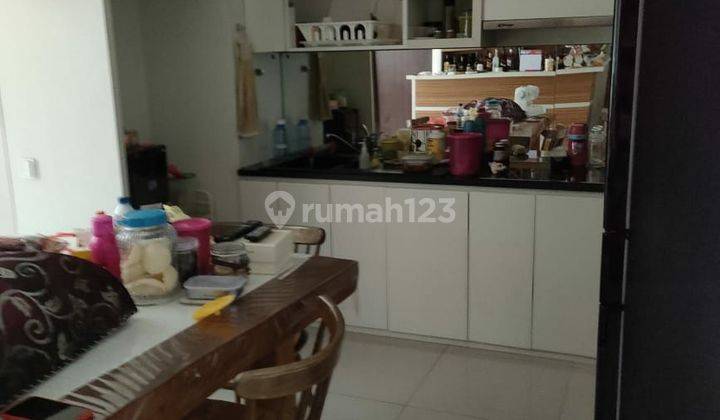 Jual rumah siap huni di the Eminent BSD - taman, kolam ikan 2