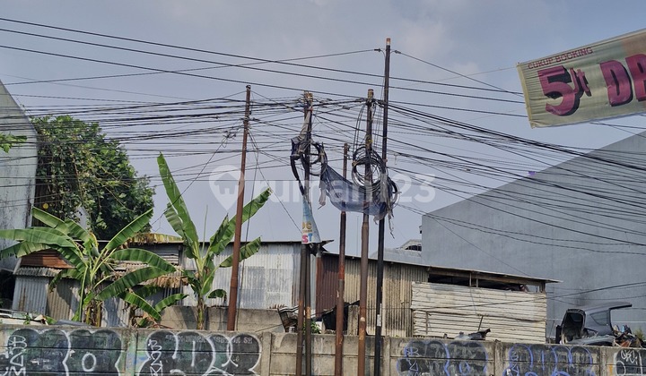 Commercial land on the main road of Parung Raya, below market price.