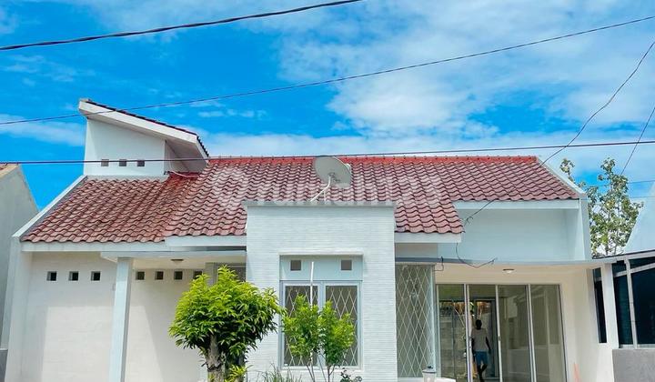 Rumah di Kompleks Perumahan Meninting