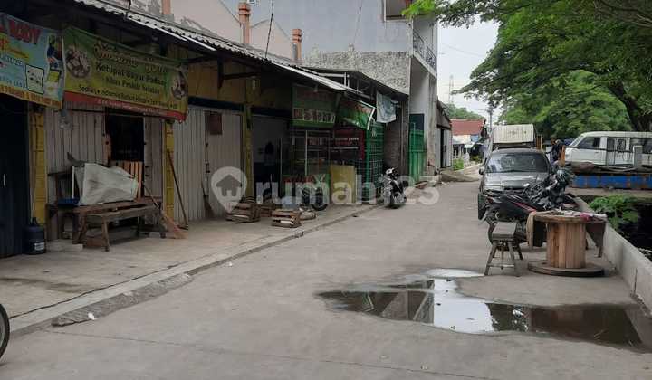 DIJUAL TANAH DAN BANGUNAN  Di jln KH. Ahmad Dahlan Kel. Petir, Kec. Cipondoh