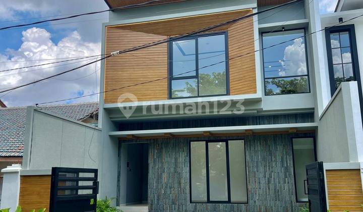 New House Tropical Ambiance in Rungkut Asri 2 Floors South Facing