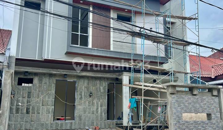 Rumah Baru Modern di Manyar Jaya Praja Hadap Selatan Dekat Untag 2