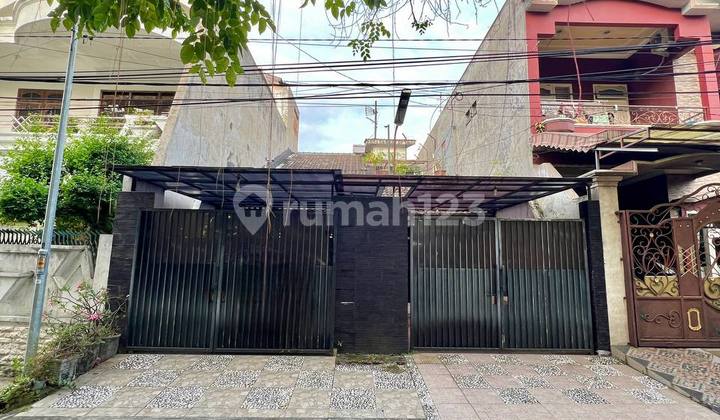 Rumah di Jalan Baratajaya, Ngagel 1,5 Lantai Dekat ke Pusat Kota