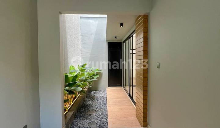 Rumah Baru Nuansa Tropical di Rungkut Asri 2 Lantai Hadap Selatan 2