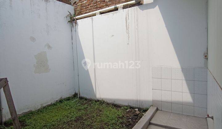 Rumah minimalis dengan Pencahayaan dan Ventilasi udara serta taman hijau cocok untuk orangtua 1